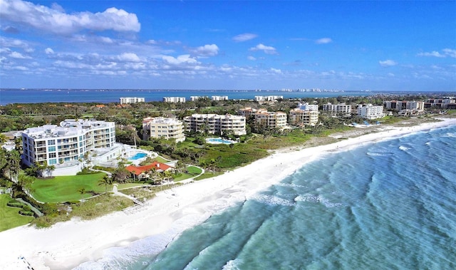 aerial view featuring a water view and a view of the beach