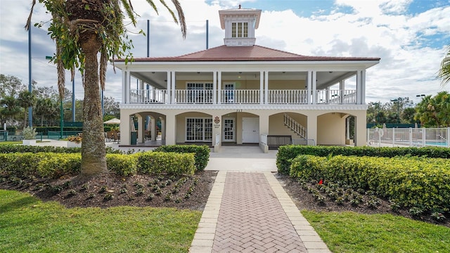 view of front of house with a balcony