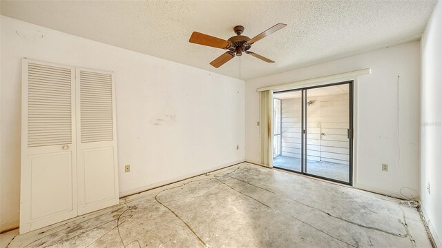 unfurnished bedroom with a textured ceiling, access to outside, and ceiling fan