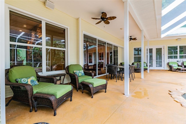 view of patio featuring ceiling fan