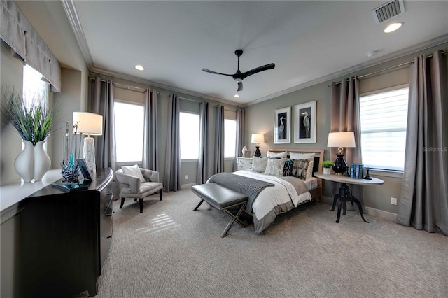 bedroom featuring carpet flooring, ceiling fan, crown molding, and multiple windows