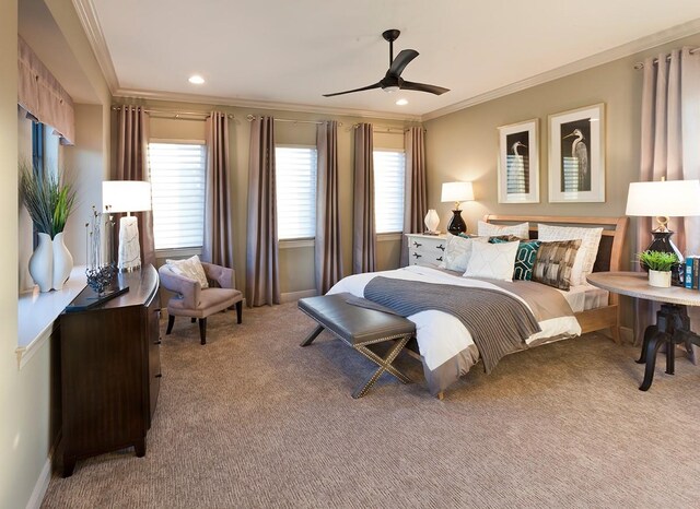 carpeted bedroom featuring multiple windows, crown molding, and ceiling fan