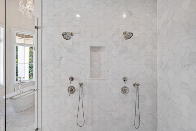 bathroom with tiled shower