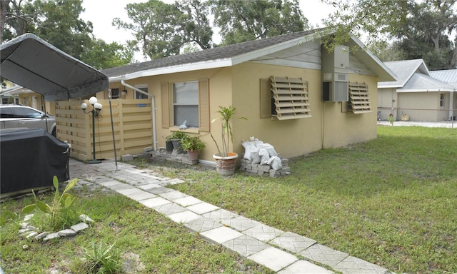 view of home's exterior featuring a lawn