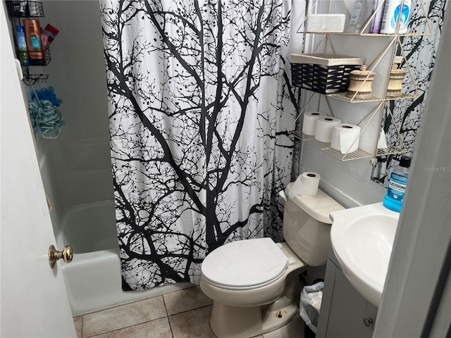 full bathroom with tile patterned flooring, toilet, sink, and shower / bath combo