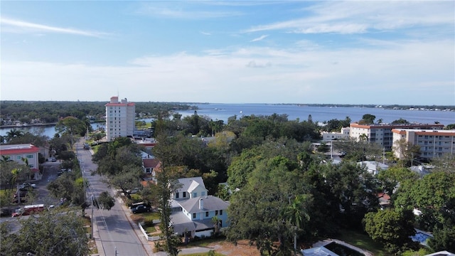 birds eye view of property featuring a water view