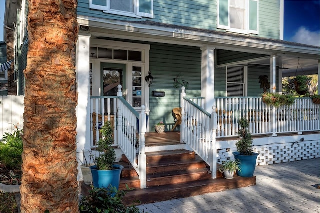 doorway to property with covered porch