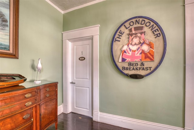 interior space featuring a textured ceiling and ornamental molding