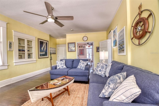 living room featuring a textured ceiling and hardwood / wood-style flooring