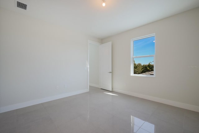 view of tiled empty room