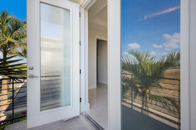 doorway to property with a balcony