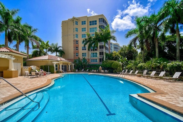 view of swimming pool with a patio area