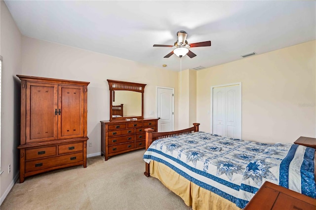 carpeted bedroom featuring ceiling fan