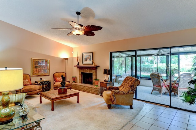 tiled living room with lofted ceiling, a fireplace, a textured ceiling, and a wealth of natural light