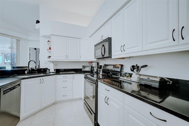 kitchen with light tile floors, range with electric cooktop, white cabinets, dishwasher, and sink