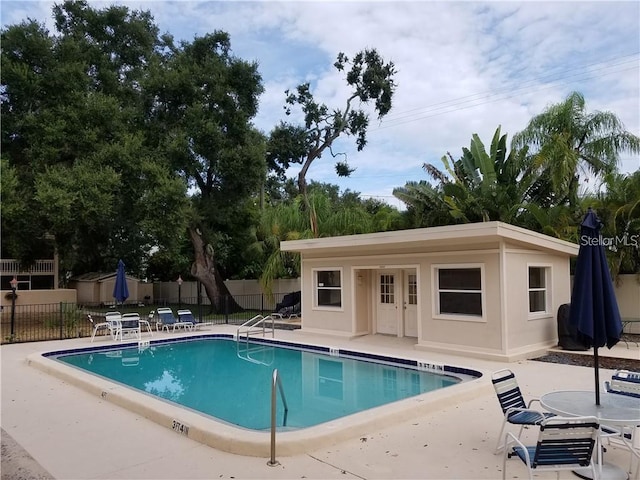 view of pool featuring a patio area