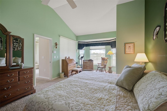 bedroom with light colored carpet, ceiling fan, and high vaulted ceiling