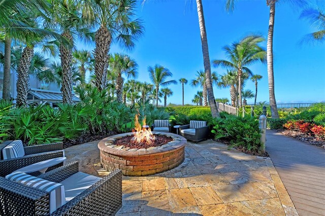 view of patio / terrace with an outdoor fire pit