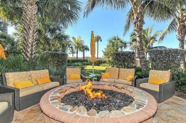 view of patio with a fire pit