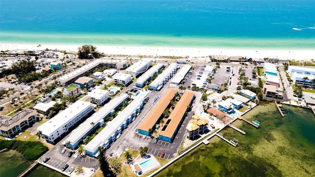 bird's eye view with a beach view and a water view