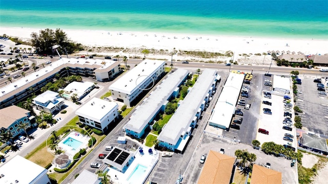 drone / aerial view with a view of the beach and a water view