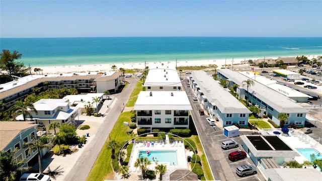 bird's eye view with a view of the beach and a water view