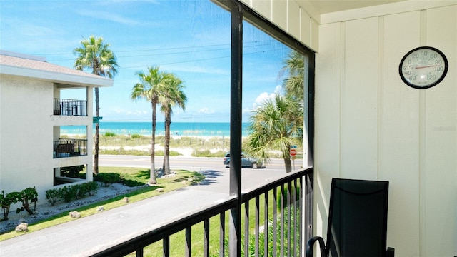 balcony featuring a water view