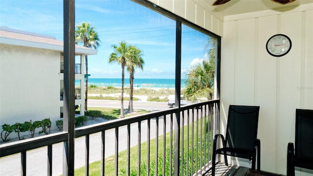 balcony featuring a water view