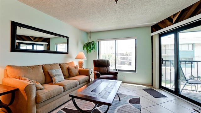 tiled living room with a textured ceiling