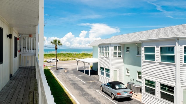 exterior space with a water view