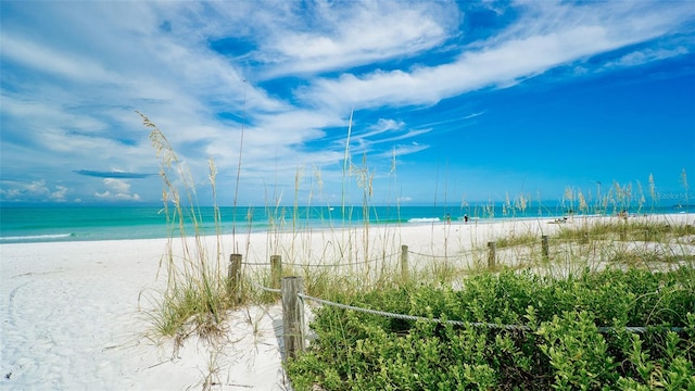 property view of water featuring a beach view