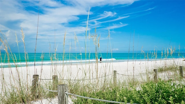 property view of water featuring a beach view