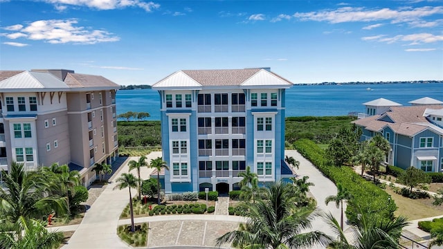 view of building exterior with a water view