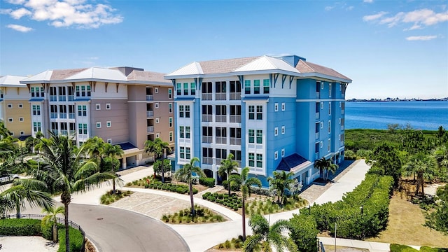 view of property with a water view