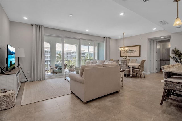 living room featuring a chandelier