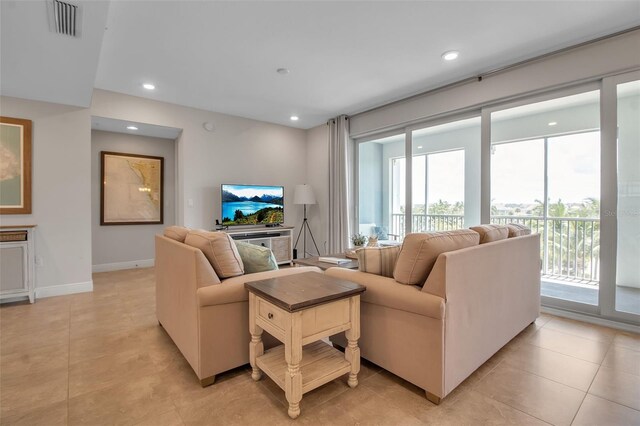 living room featuring light tile patterned floors