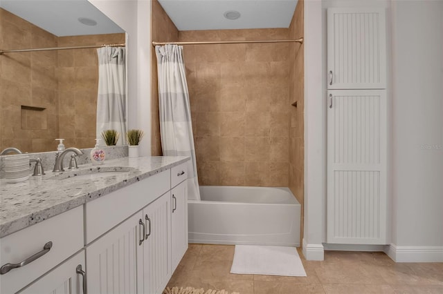 bathroom with tile patterned floors, vanity, and shower / tub combo