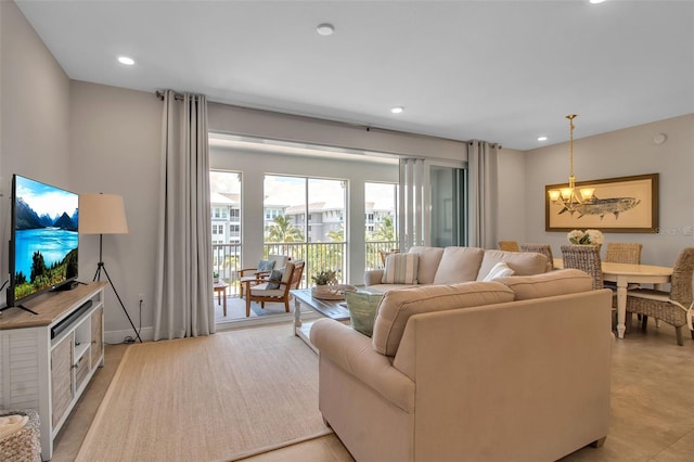 living room featuring a chandelier