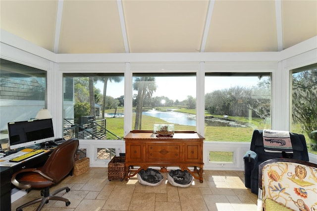 sunroom / solarium featuring lofted ceiling with beams and a water view