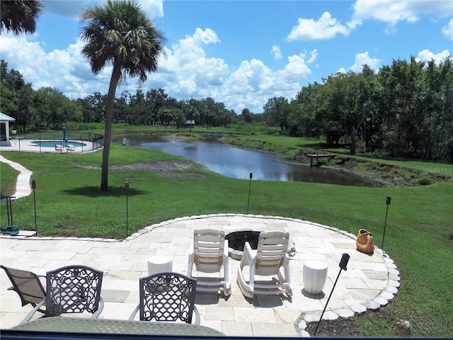 view of patio featuring a water view