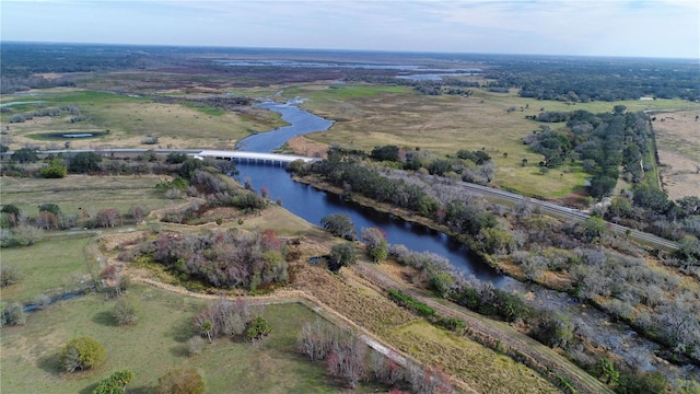 aerial view with a rural view and a water view