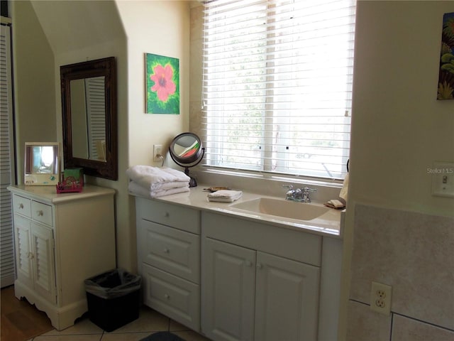 bathroom with tile patterned flooring and sink