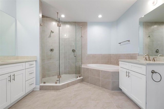 bathroom with vanity, separate shower and tub, and tile patterned floors