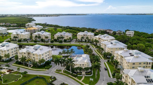 bird's eye view with a water view