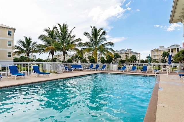 view of swimming pool with a patio area