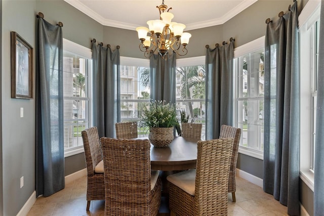 tiled dining room featuring crown molding and a notable chandelier