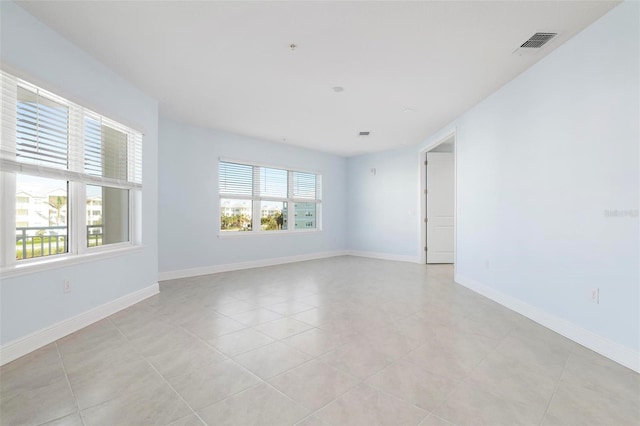 view of tiled spare room