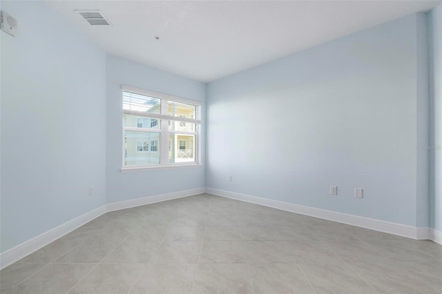 view of tiled empty room