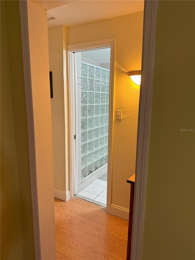 hallway featuring light wood-type flooring