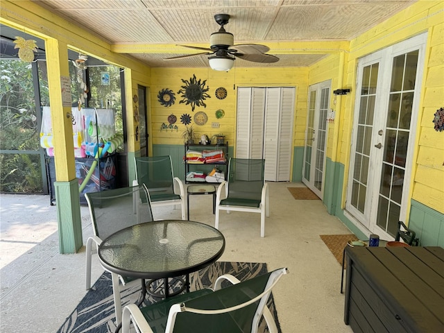 view of patio with ceiling fan and french doors